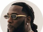 Burna Boy warns internet troll of legal action over defamatory comment